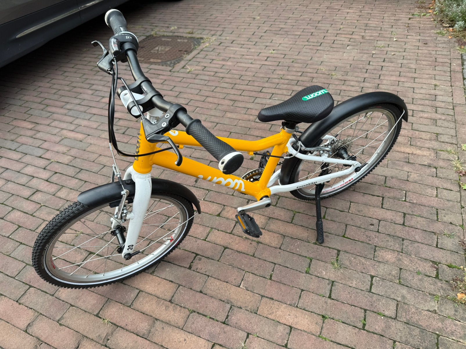 Woom 4 kinderfiets, Ophalen, Zo goed als nieuw, Staal