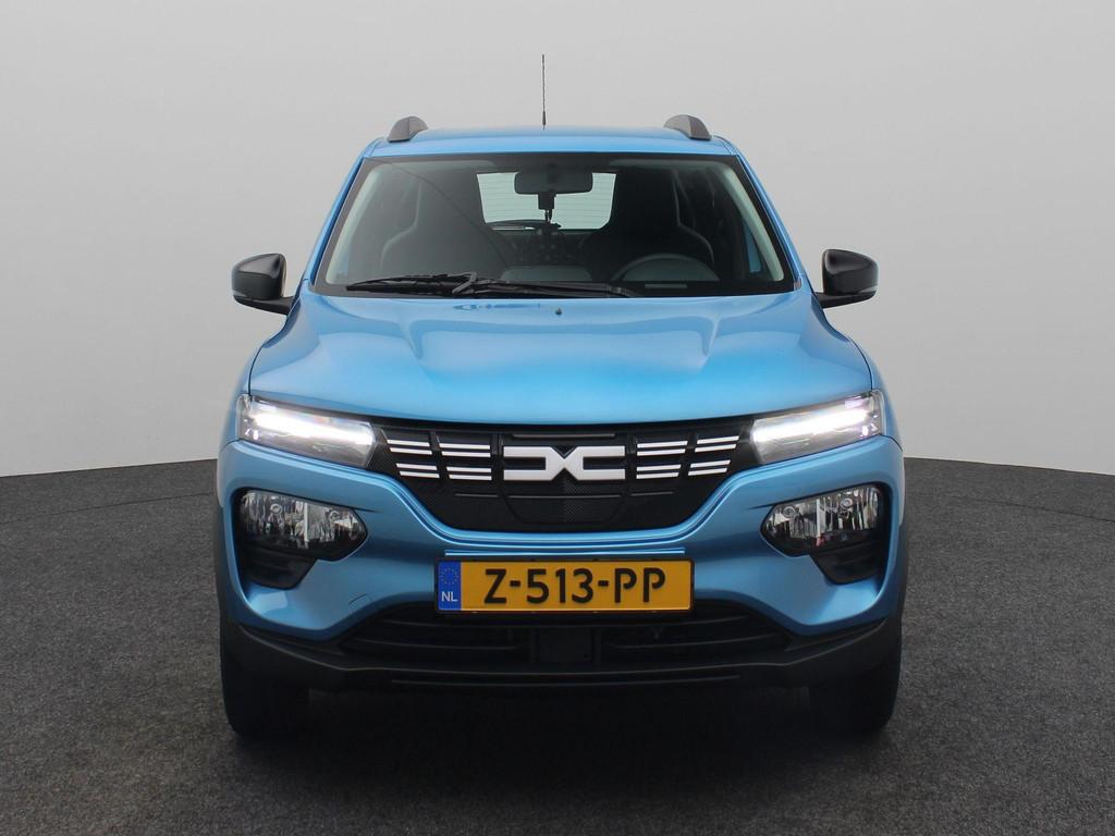 Dacia Spring Essential 27 kWh Achteruitrijcamera | Navigatie, Auto's, 12 maanden, Gebruikt, Zwart, Leder en Stof