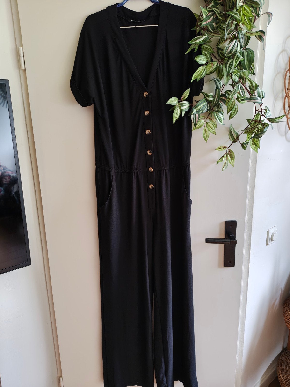 zwart stretch kreukvrij jumpsuit maat 40  42, Kleding | Dames, Ophalen of Verzenden, Zo goed als nieuw, Maat 38/40 (M), Zwart
