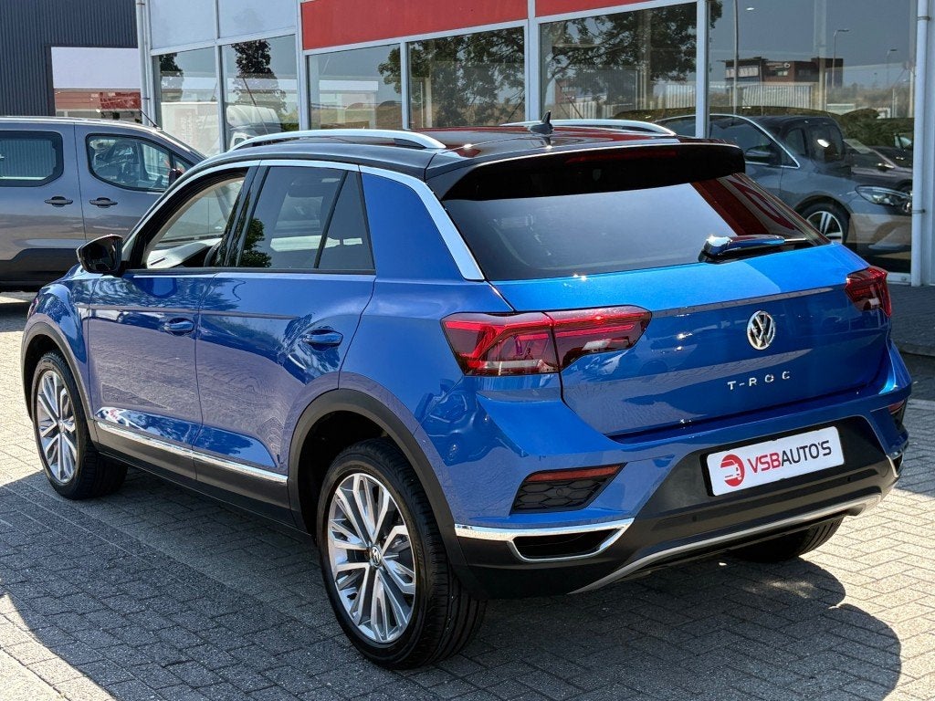 Volkswagen T-ROC 1.5 TSI ACT. SPORT 150PK DIGITALE-SCHERM WI, Auto's, Volkswagen, Huisgarantie, Blauw, Leder, Bedrijf