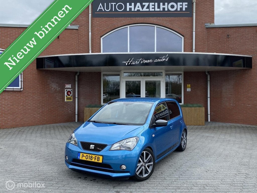 SEAT Mii 1.0 FR Intense 75pk met 67.477km | Stoelverwarming, Auto's, Voorwielaandrijving, Stof, Gebruikt, Blauw