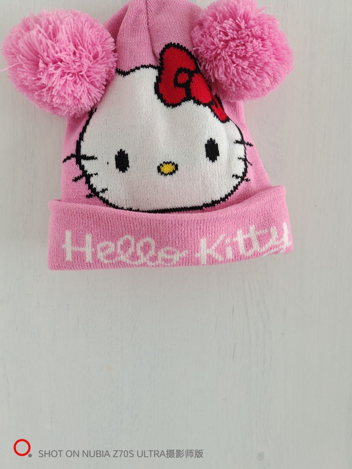 Roze Hello Kitty Muts met Pompons, Meisje, Nieuw, Ophalen of Verzenden, 104 of kleiner