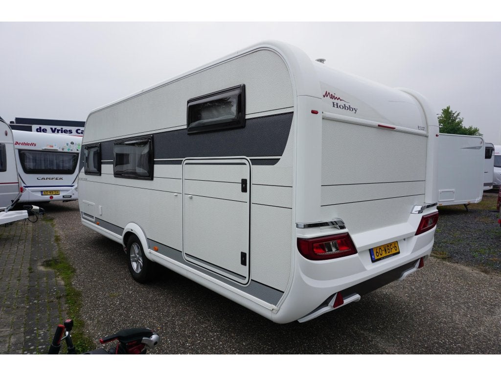 Hobby De Luxe Edition 545 KMF Mover airco Unicovoortent, Caravans en Kamperen, Schokbreker, Hobby, Bedrijf, 5 tot 6 meter