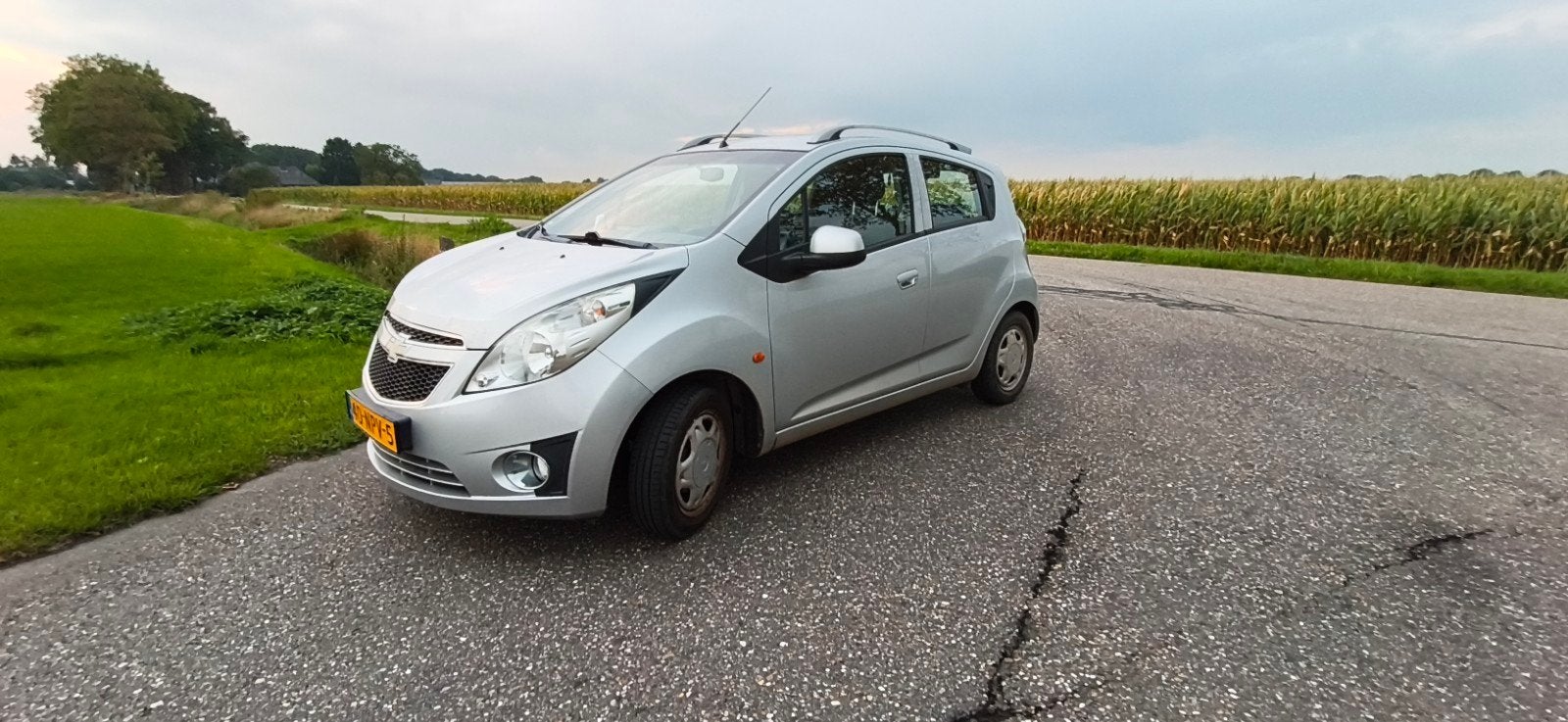 Chevrolet Spark 1.0 Bifuel 2010 Grijs, Auto's, 15 km/l, 37 €/maand, 4 cilinders, Elektrische ramen