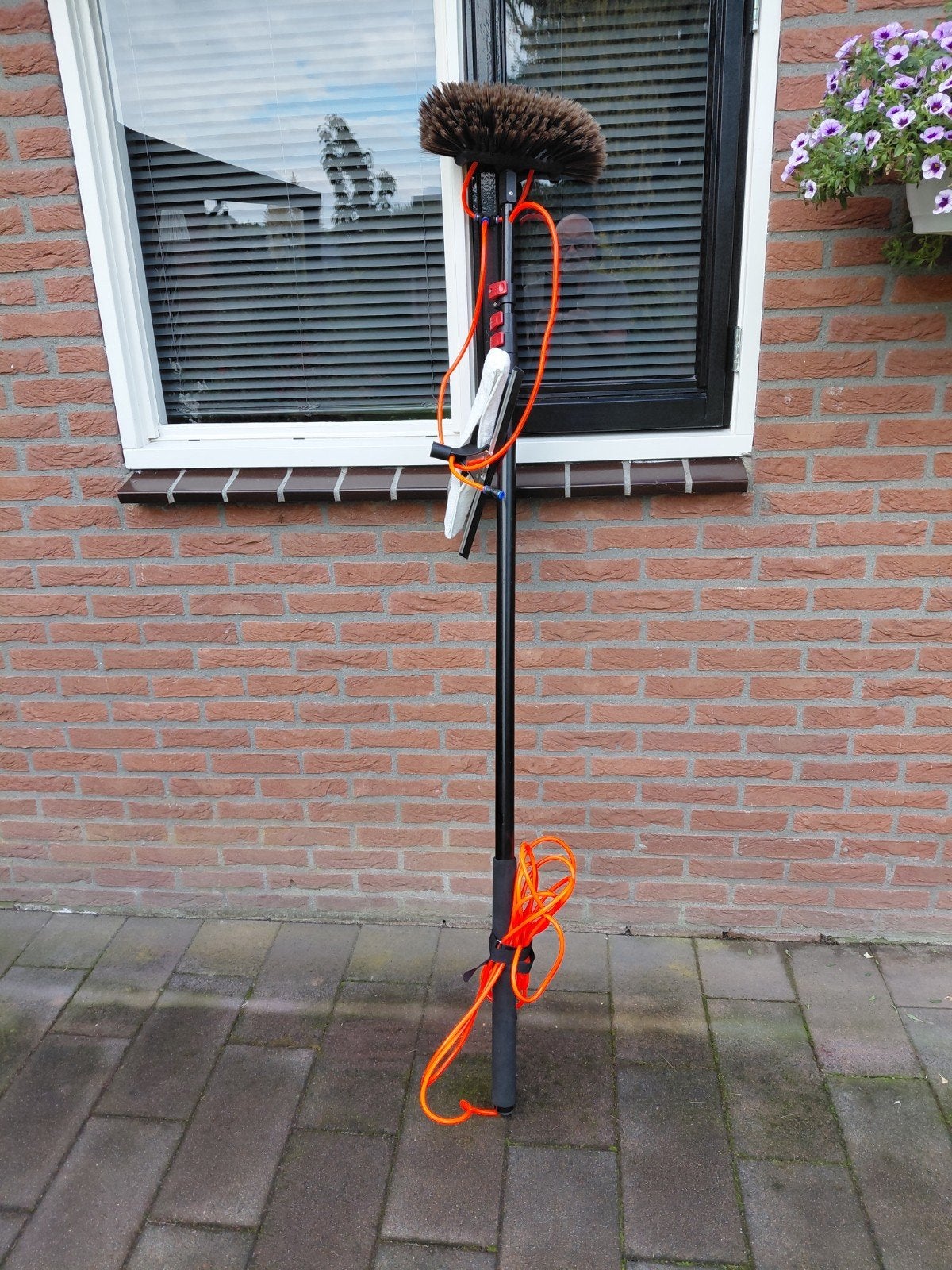 telescopische waterborstel, Ophalen