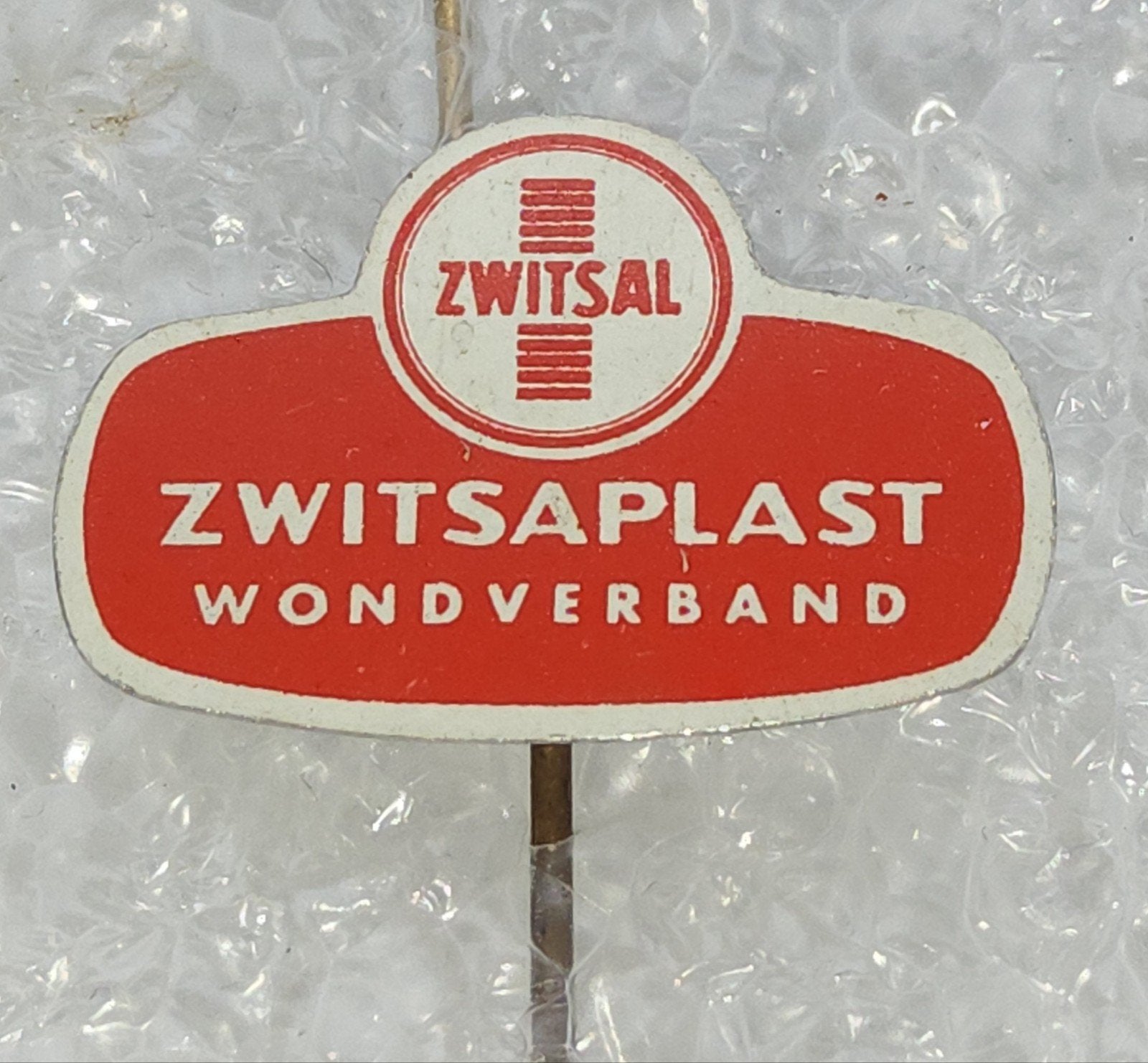 Vintage Zwitsal Zwitsaplast Wondverband Speldje, Ophalen of Verzenden, Gebruikt, Merk, Speldje of Pin