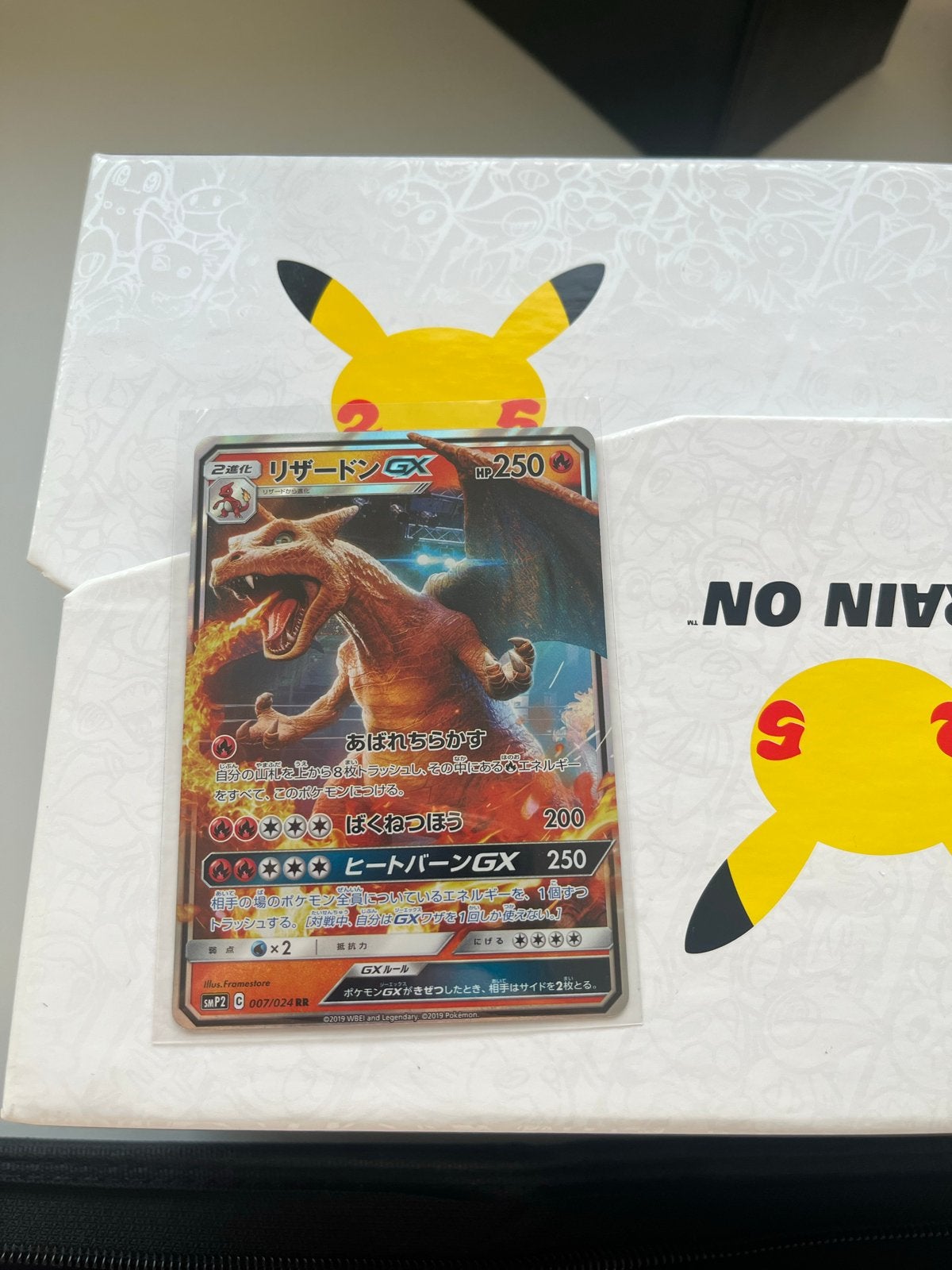 Charizard GX detective pikachu 007/024 Holo, Ophalen of Verzenden, Zo goed als nieuw, Losse kaart, Foil