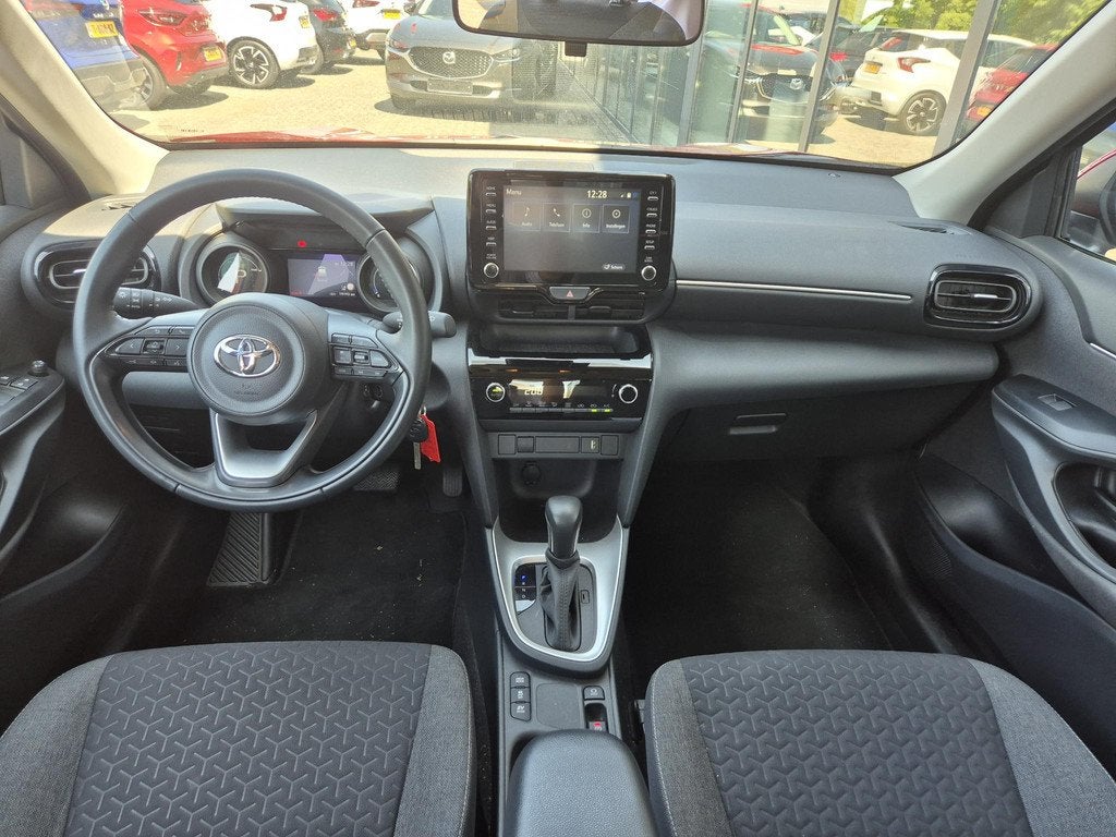 Toyota Yaris Cross 1.5 Hybrid Active | AppleCarplay/AndroidA, Auto's, Stof, Gebruikt, Met garantie (alle), 116 pk