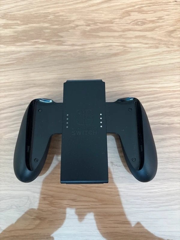 Nintendo Switch Joy-Con Grip origineel zwart, Ophalen of Verzenden, Zo goed als nieuw, Zonder controller, Switch Original