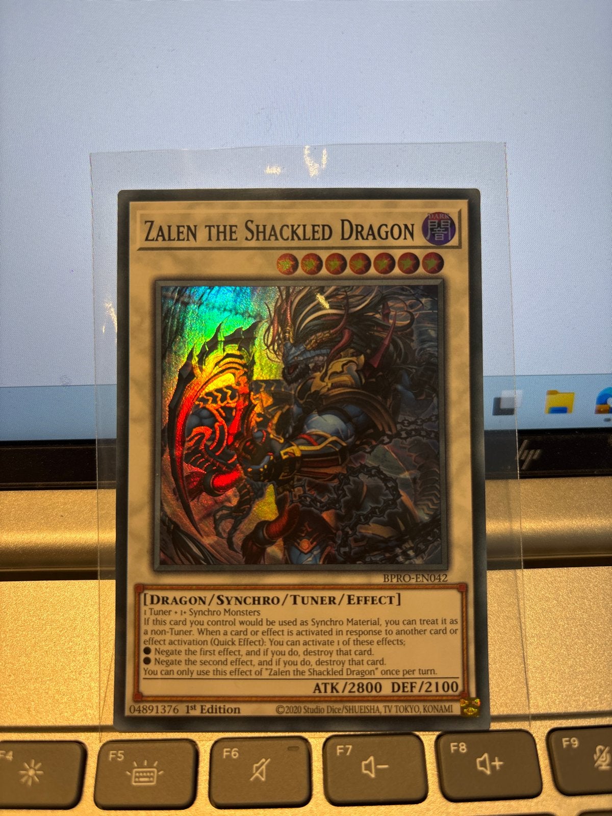 Zalen the Shackled Dragon - Yu-Gi-Oh! Kaart - Nieuw, Ophalen of Verzenden, Nieuw, Losse kaart, Foil