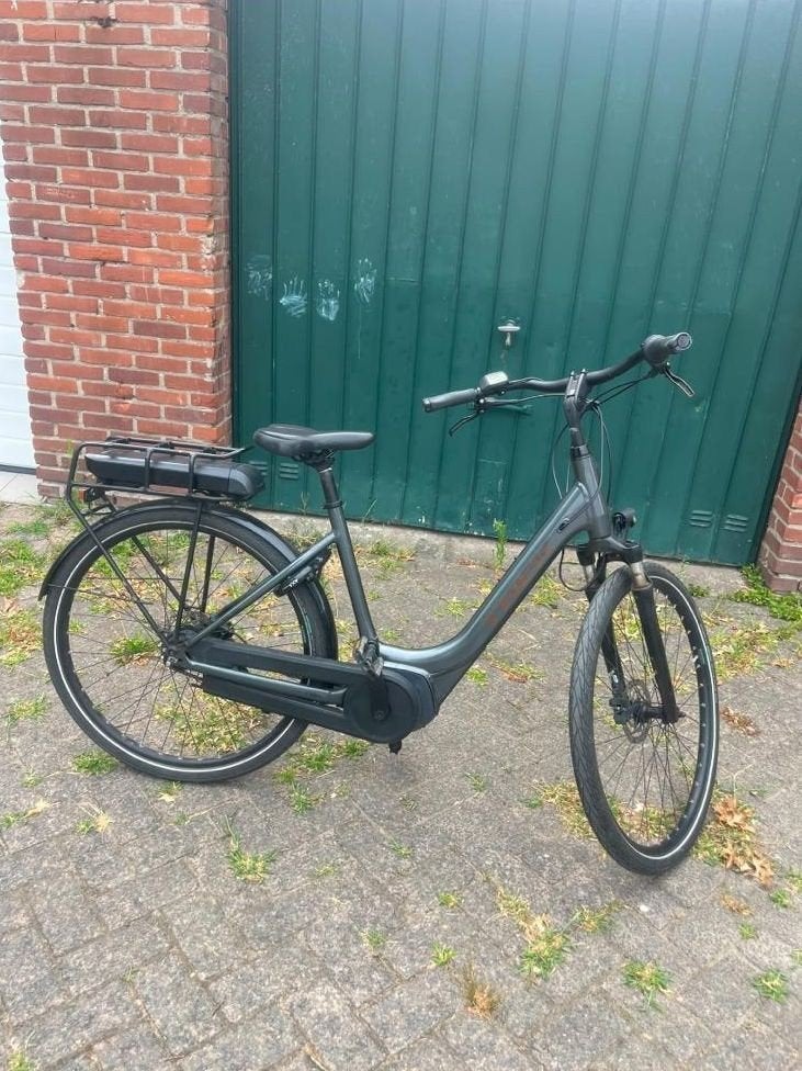 Nette trek elektrische fiets met lader, Ophalen, Gebruikt, 50 km per accu of meer, Overige merken