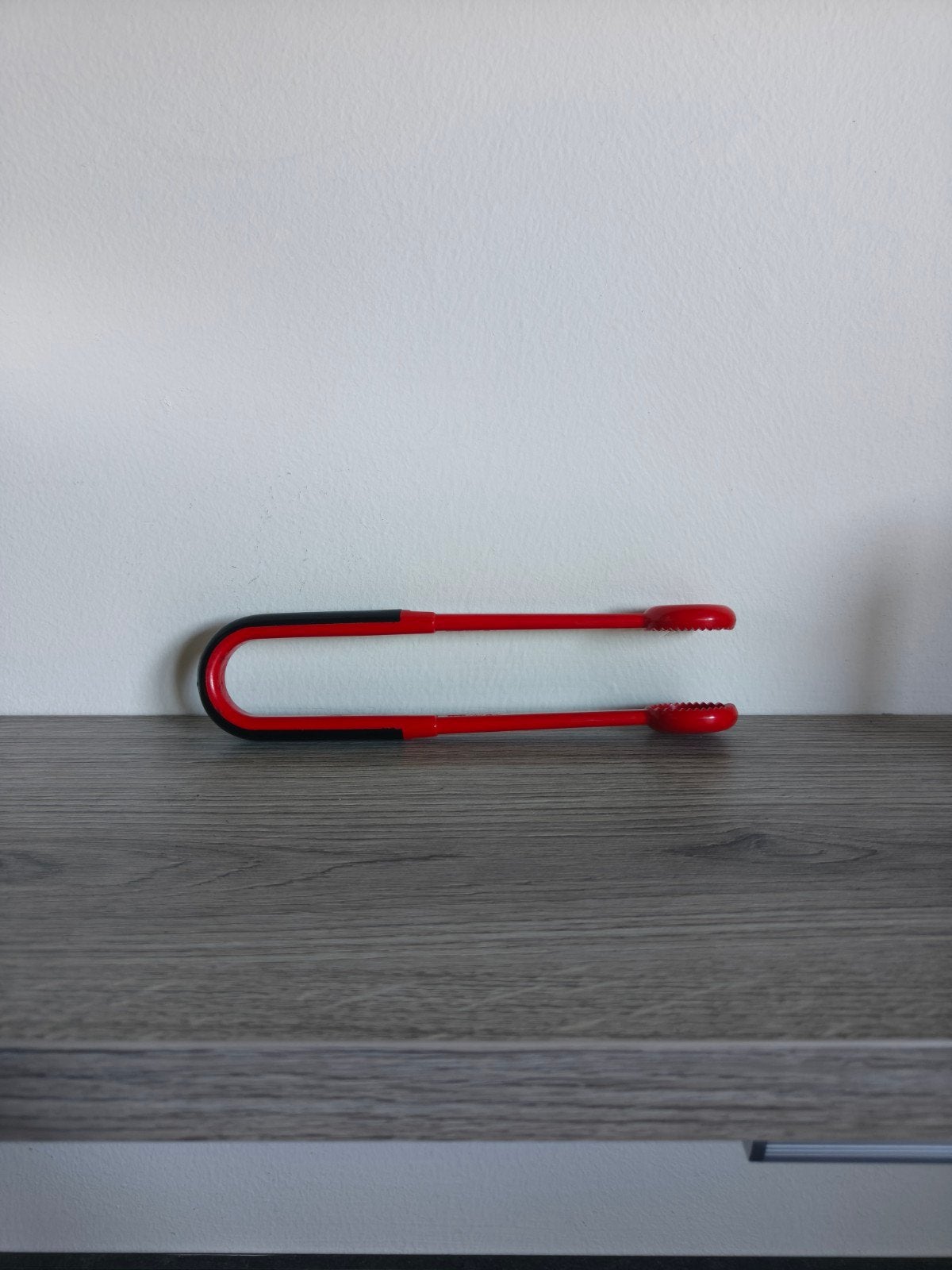 Coebergh relatiegeschenk: Rode kunststof ijstang, Ophalen of Verzenden, Zo goed als nieuw, Kunststof, Rood