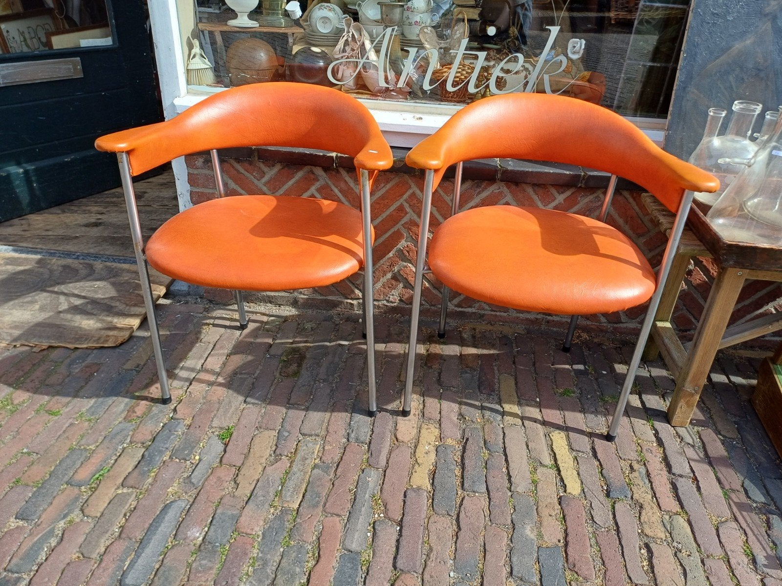 Set van 2 vintage Fasem oranje stoelen met chromen onderstel, Ophalen