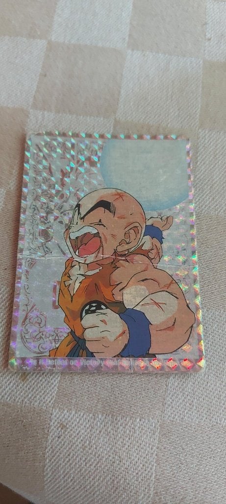 dragonball z kaart glitter Krillin energy ball beschadigd, Ophalen of Verzenden, Gebruikt, Losse kaart