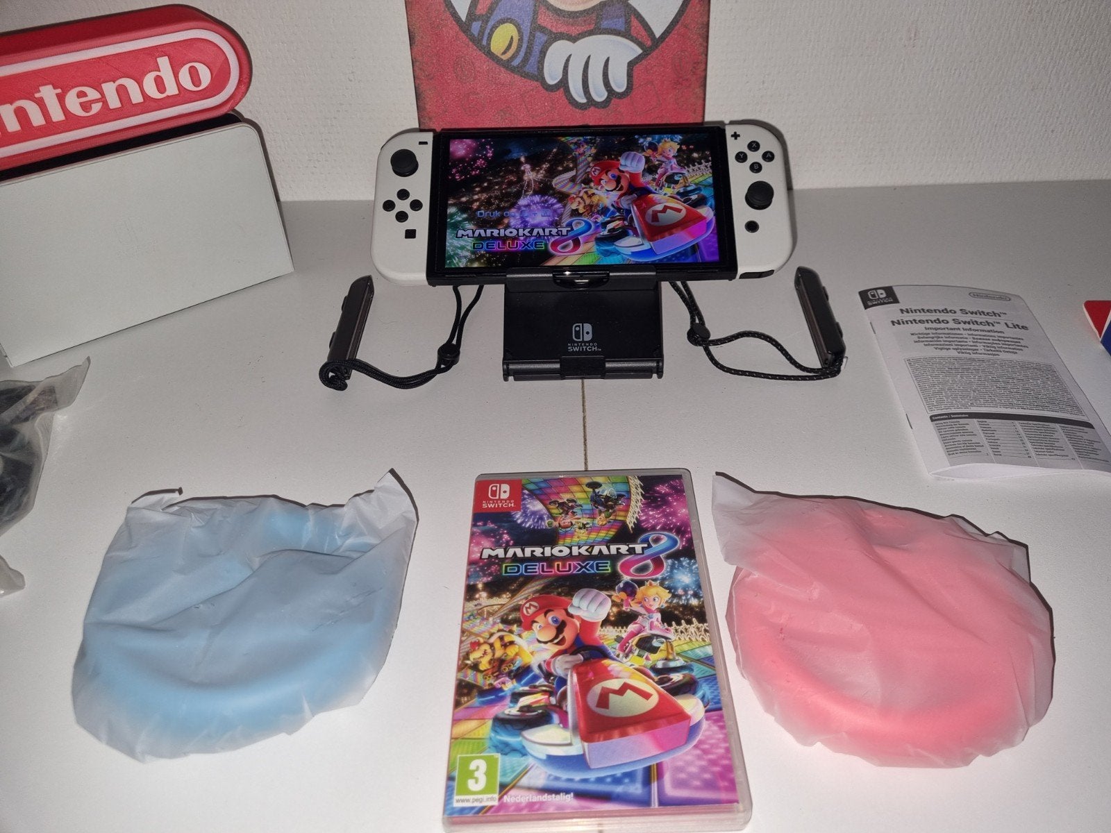 NINTENDO SWITCH OLED (2024) MARIO KART BUNDEL, Spelcomputers en Games, Switch OLED, Met 2 controllers, Ophalen of Verzenden, Zo goed als nieuw