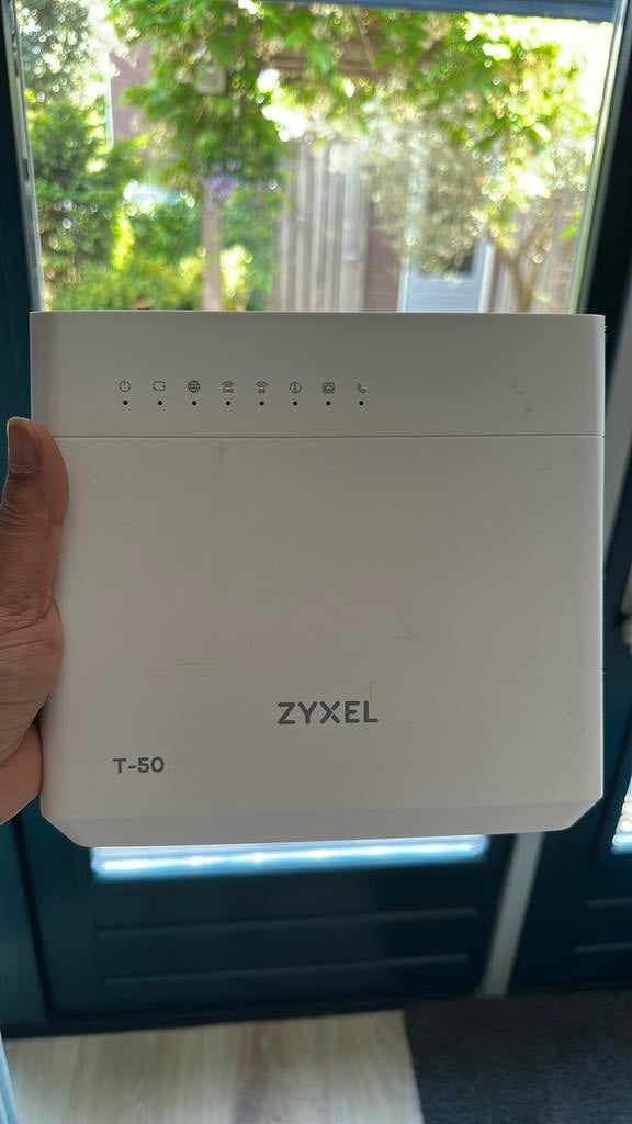 Zyxel modem T50, Computers en Software, Routers en Modems, Ophalen of Verzenden, Zo goed als nieuw