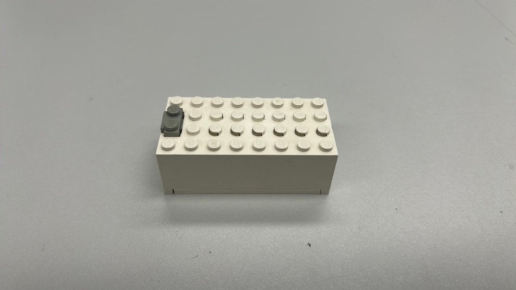 SB2882 Lego batterijbox 9 volt 4760c01 wit, Ophalen of Verzenden, Zo goed als nieuw
