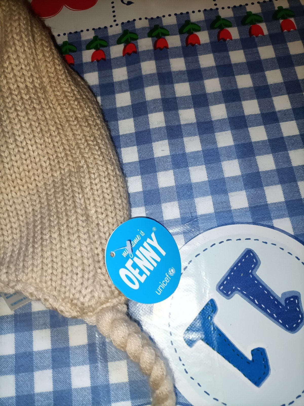Muts van Oenny Unicef Nieuw met kaartje, Ophalen of Verzenden, Nieuw, Jongen of Meisje, Muts