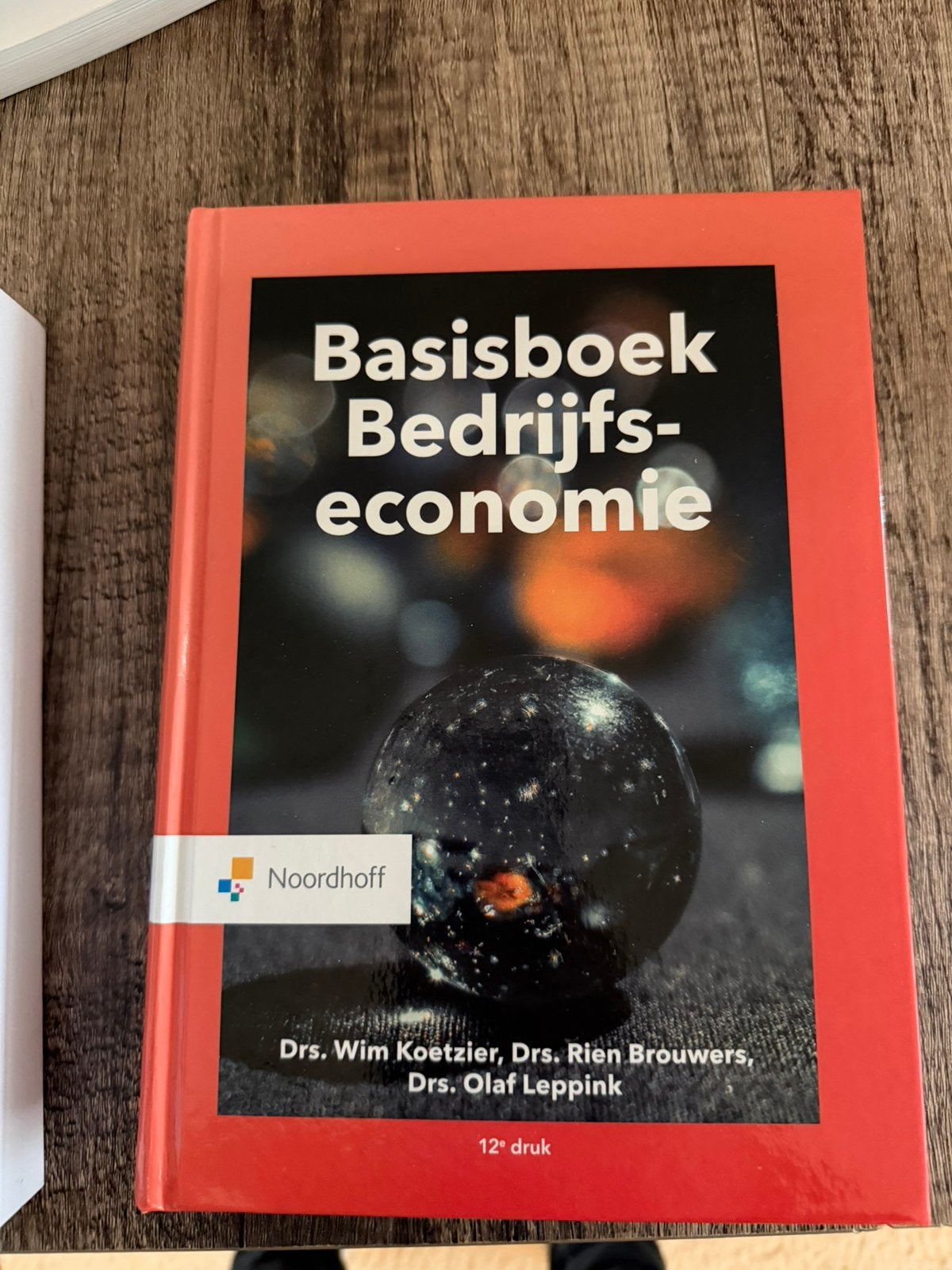 Basisboek Bedrijfseconomie (12e druk), Boeken, Ophalen of Verzenden, Zo goed als nieuw, Economie en Marketing