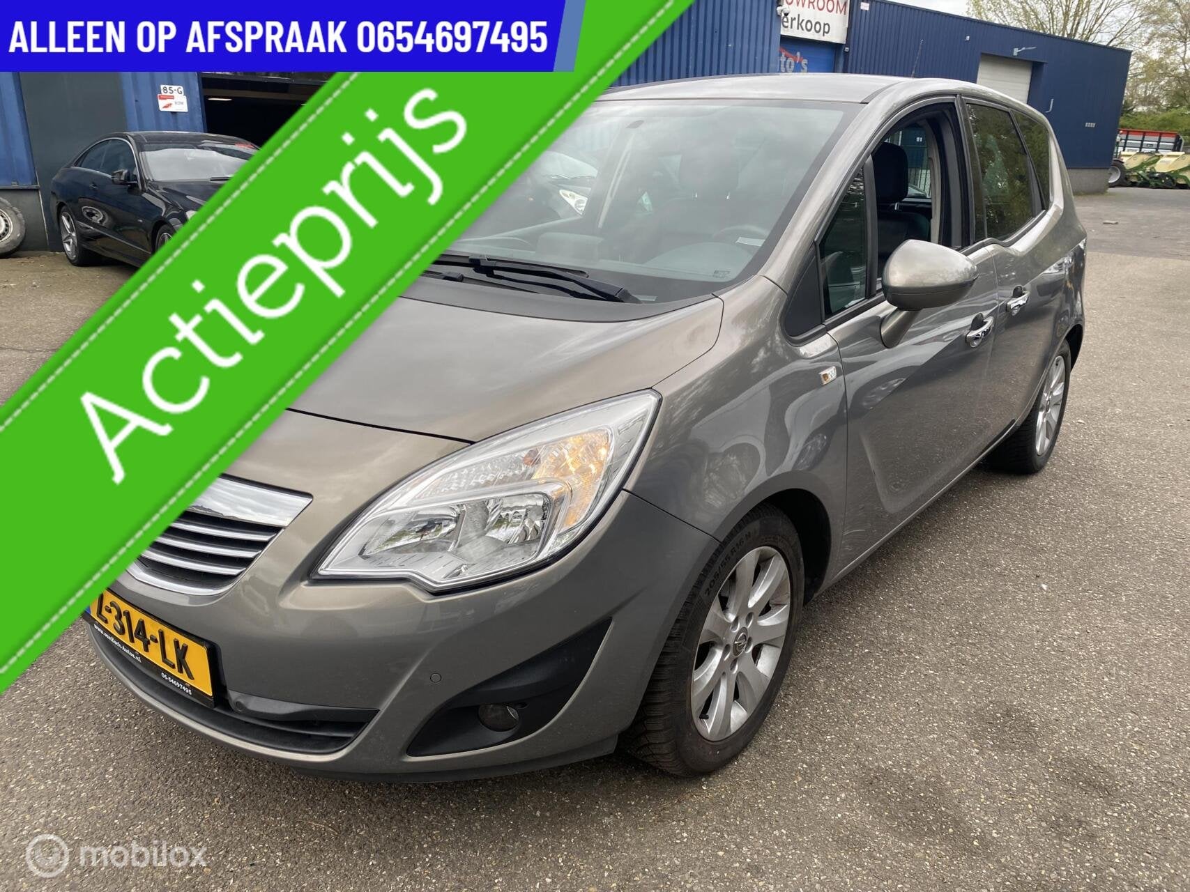 Opel Meriva 1.4 Cosmo 93.DKM STOEL/STUUR VERW ECC NAVI PDC C, Auto's, Voorwielaandrijving, Euro 5, 101 pk, Gebruikt