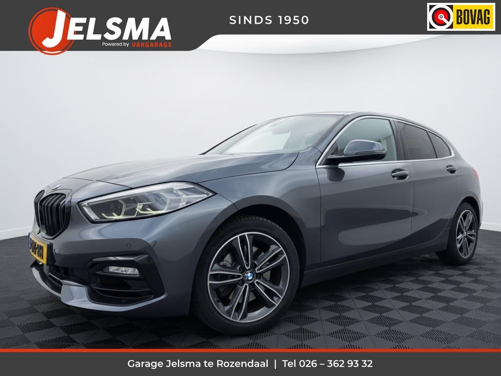 BMW 1-serie 118i High Executive edition, Sport-line | Leer |, Auto's, BMW, Gebruikt, 3 cilinders, Zilver of Grijs, 695 kg