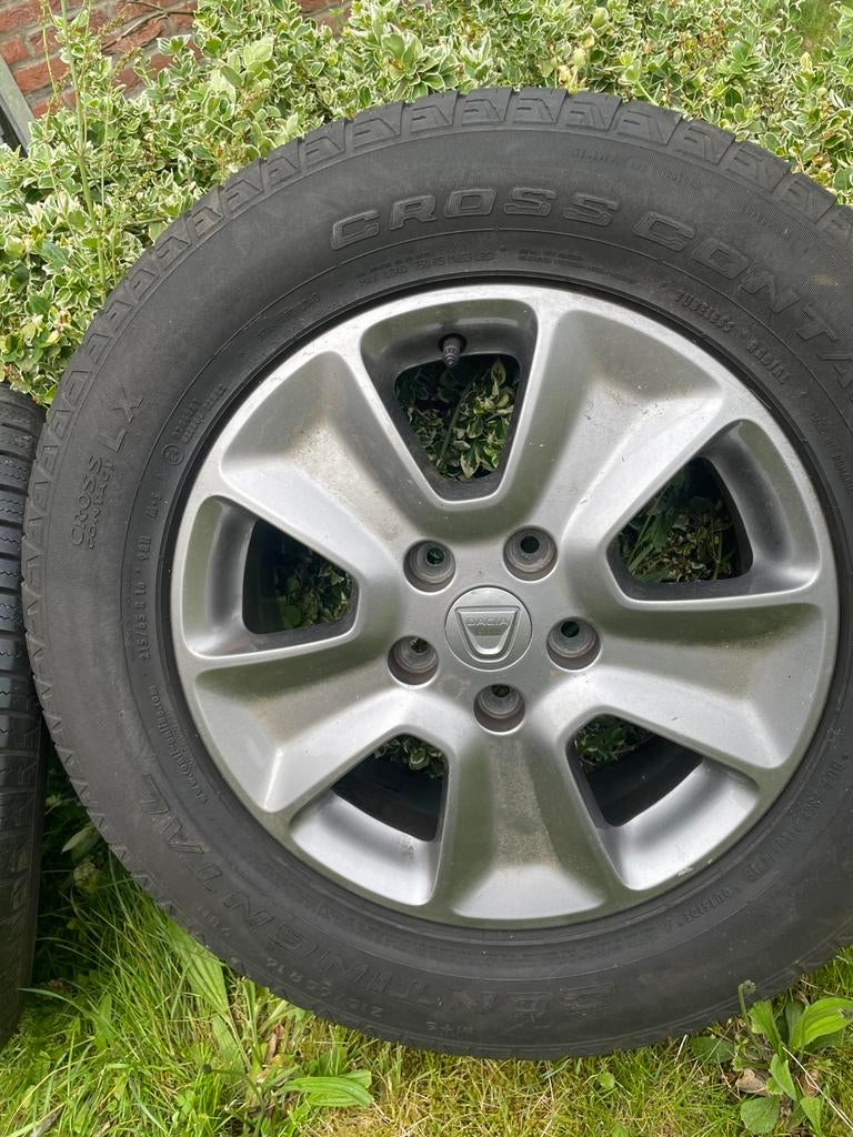 Orginele Dacia Duster lichtmetalen velgen met band., Ophalen, 16 inch, Banden en Velgen, Zomerbanden