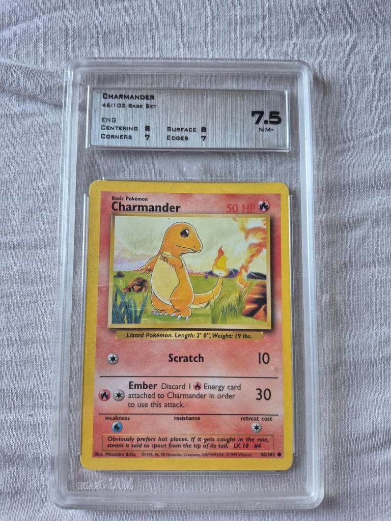 Pokémon Charmander 46/102 MTG Grade 7.5 in hardcase, Hobby en Vrije tijd, Ophalen of Verzenden, Zo goed als nieuw, Losse kaart