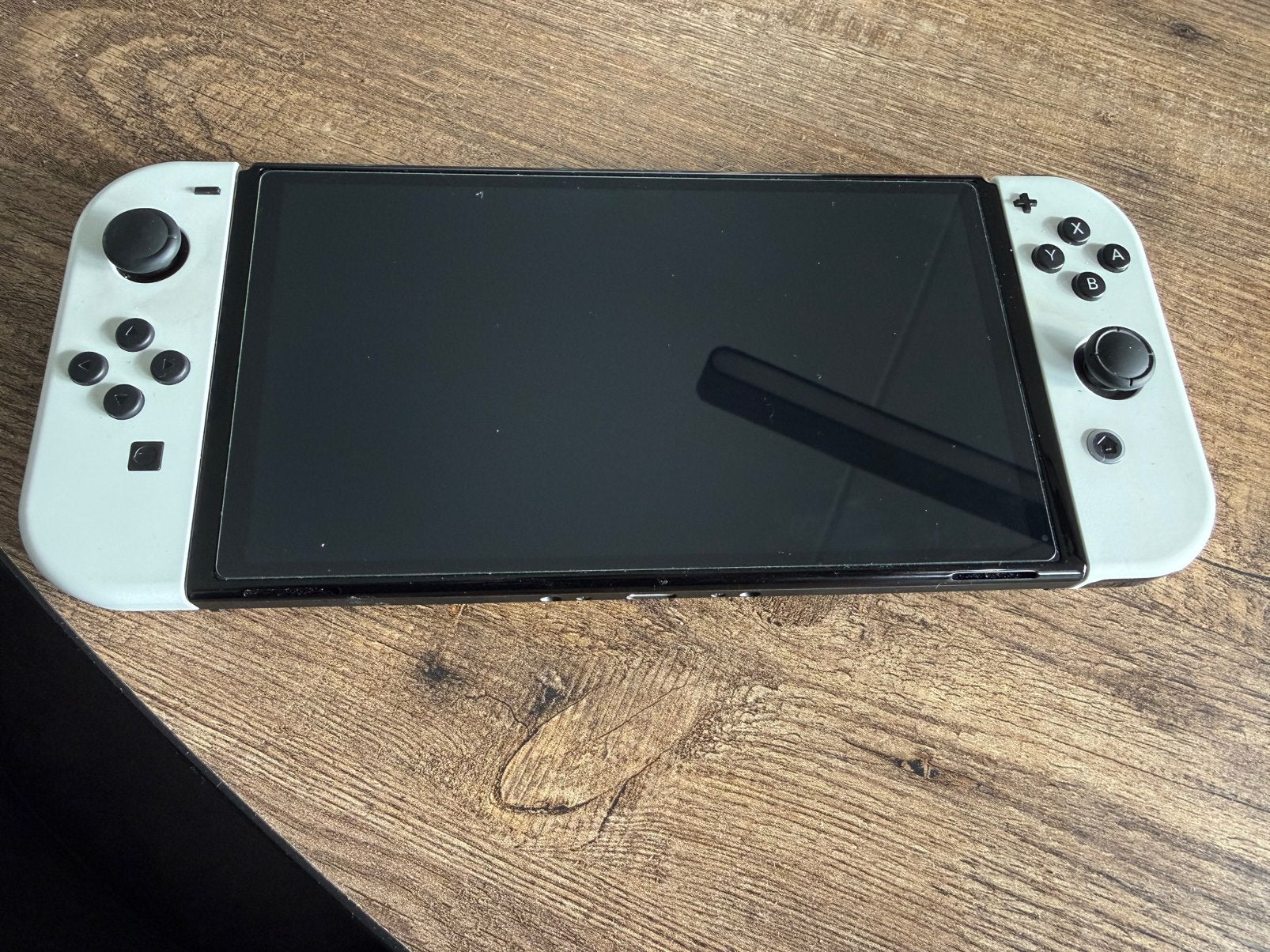 Foto 3 van Nintendo Switch OLED – zo goed als nieuw + extra controllers