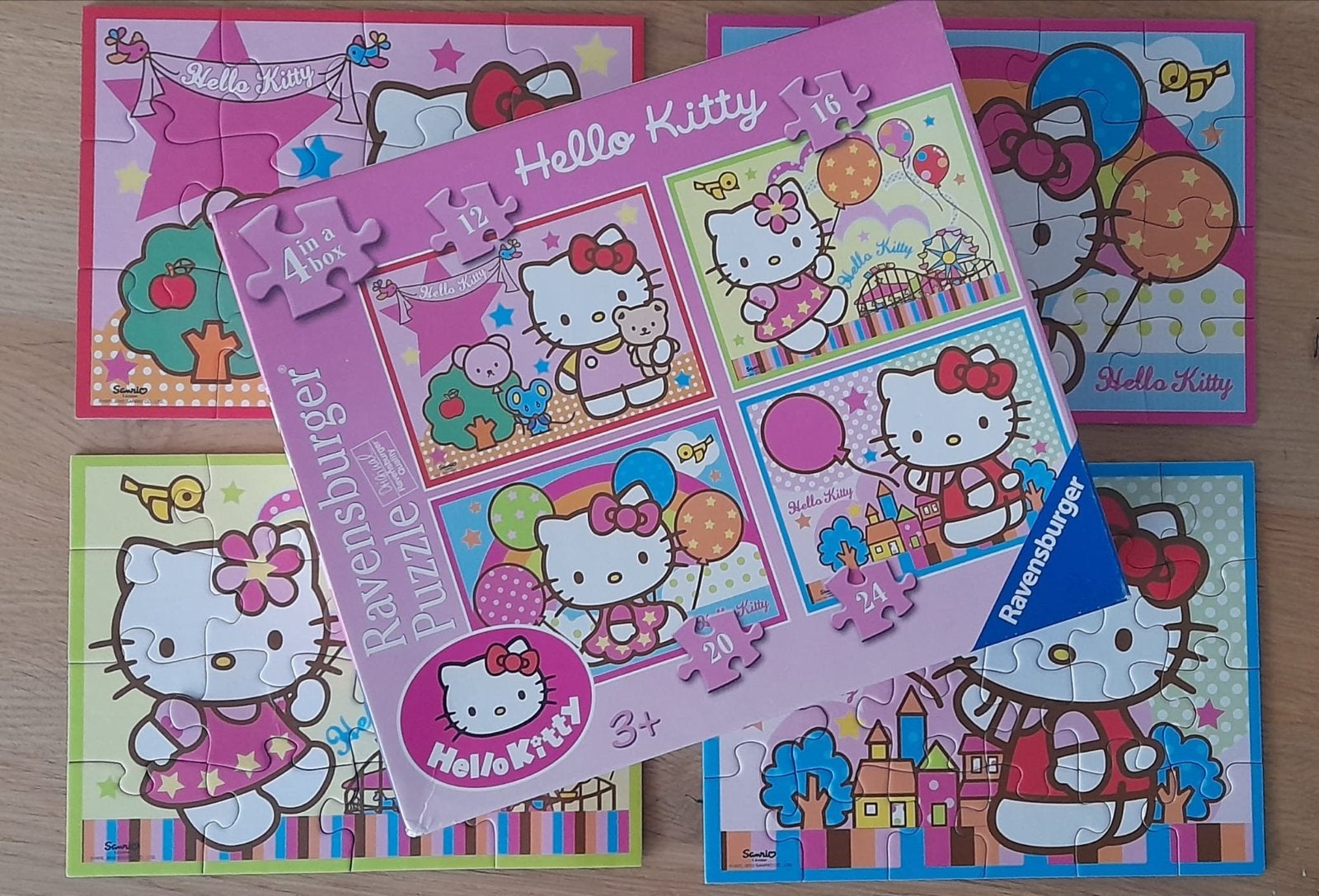 Hello Kitty Ravensburger Puzzelset (4 in 1), Ophalen of Verzenden, 10 tot 50 stukjes, Zo goed als nieuw, 2 tot 4 jaar