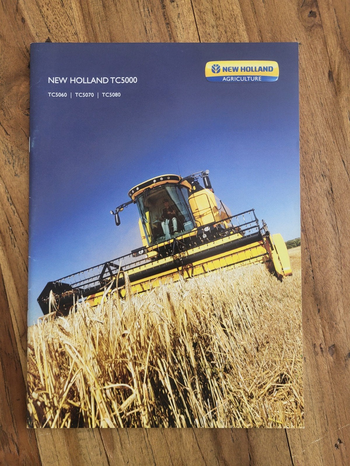 tractor folder New Holland TC5000 combine, Ophalen of Verzenden, Zo goed als nieuw