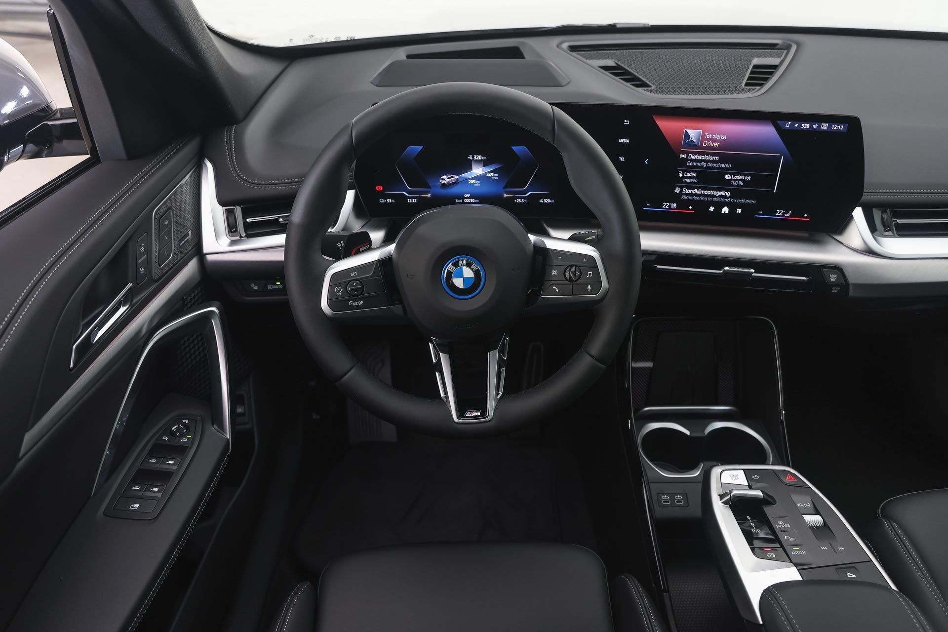 BMW iX1 eDrive20 M Sport / Trekhaak / Panoramadak / Sportsto, Auto's, Zwart, Leder, Stoelverwarming, Nieuw