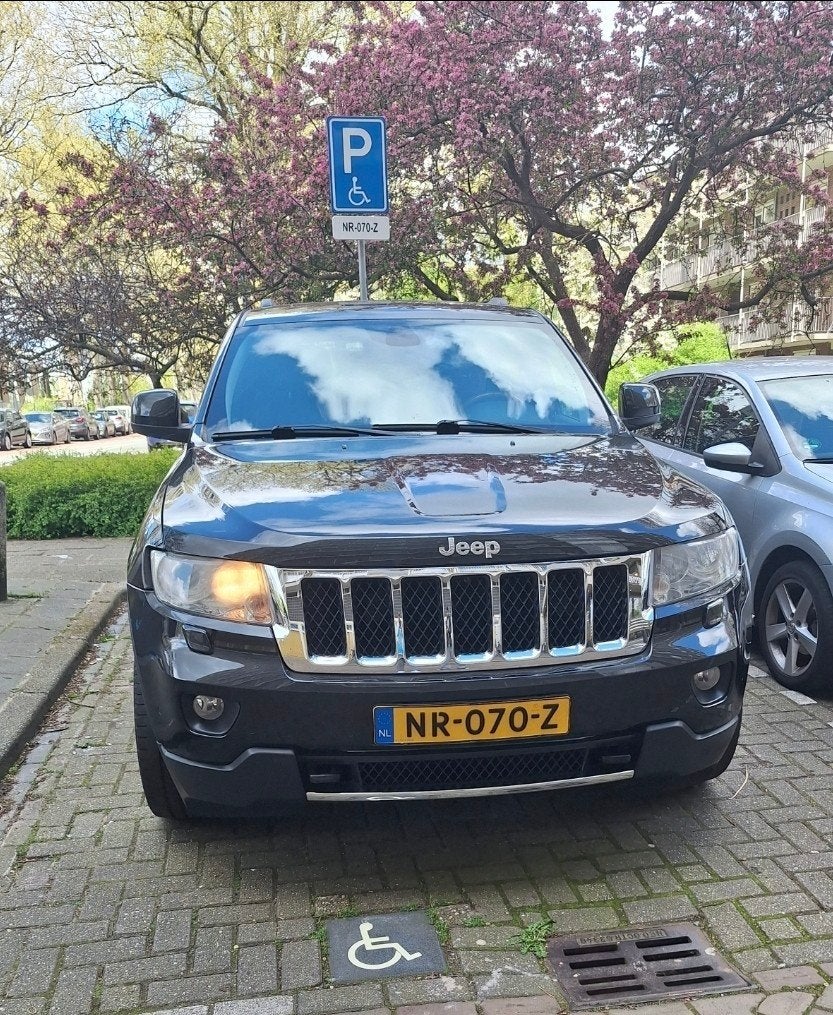 Jeep Grand Cherokee 3.6 V6 AWD AUT 2011 Zwart, Auto's, Automaat, 2268 kg, Zwart, 286 pk