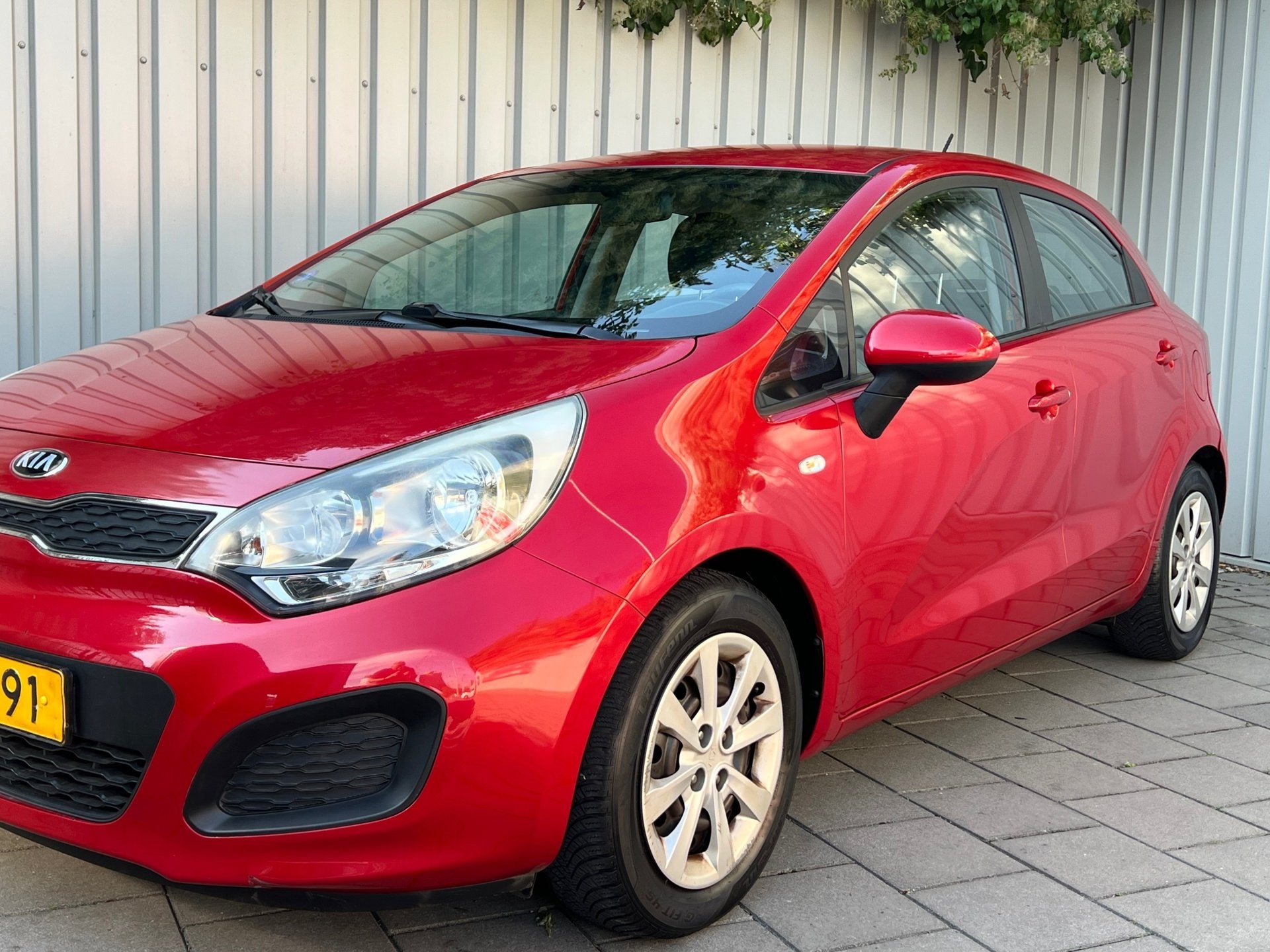Kia Rio 1.2 CVVT Comfort Pack|113000KM|Navigatie|Airco|, Auto's, Zwart, 4 cilinders, Verwarmde buitenspiegels, Origineel Nederlands