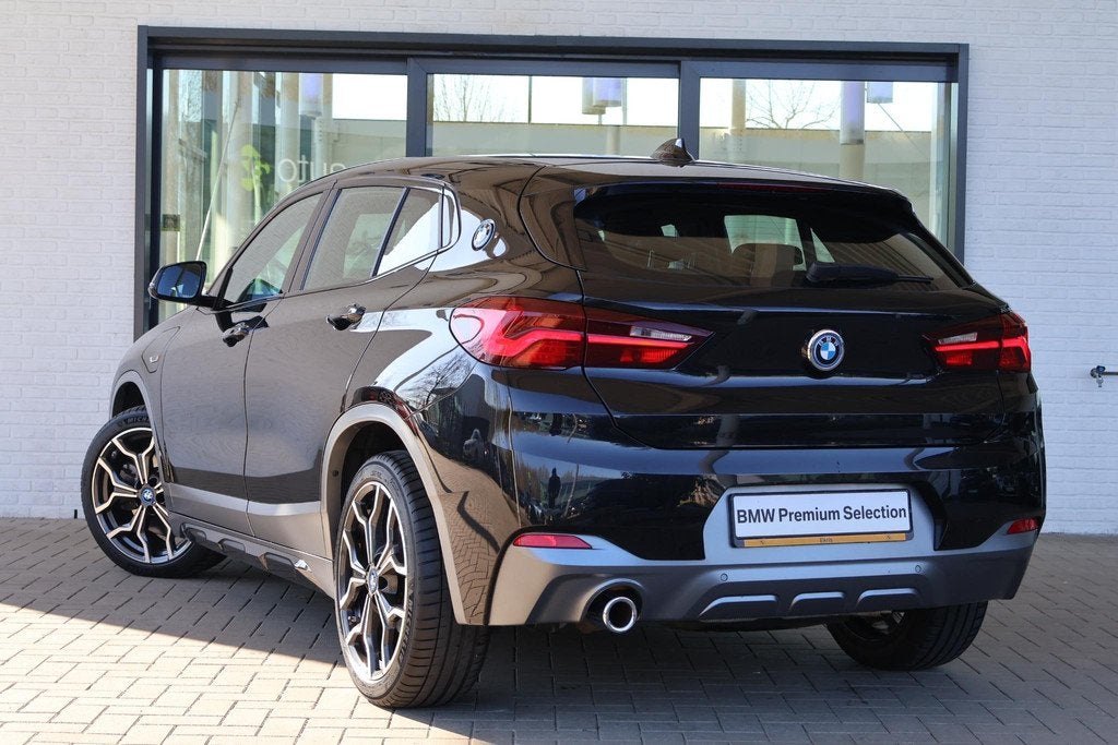 BMW X2 xDrive25e High Executive | M Sport | HiFi | Comfort A, Auto's, BMW, Automaat, Automatische klimaatregeling, Zwart, Met garantie (alle)