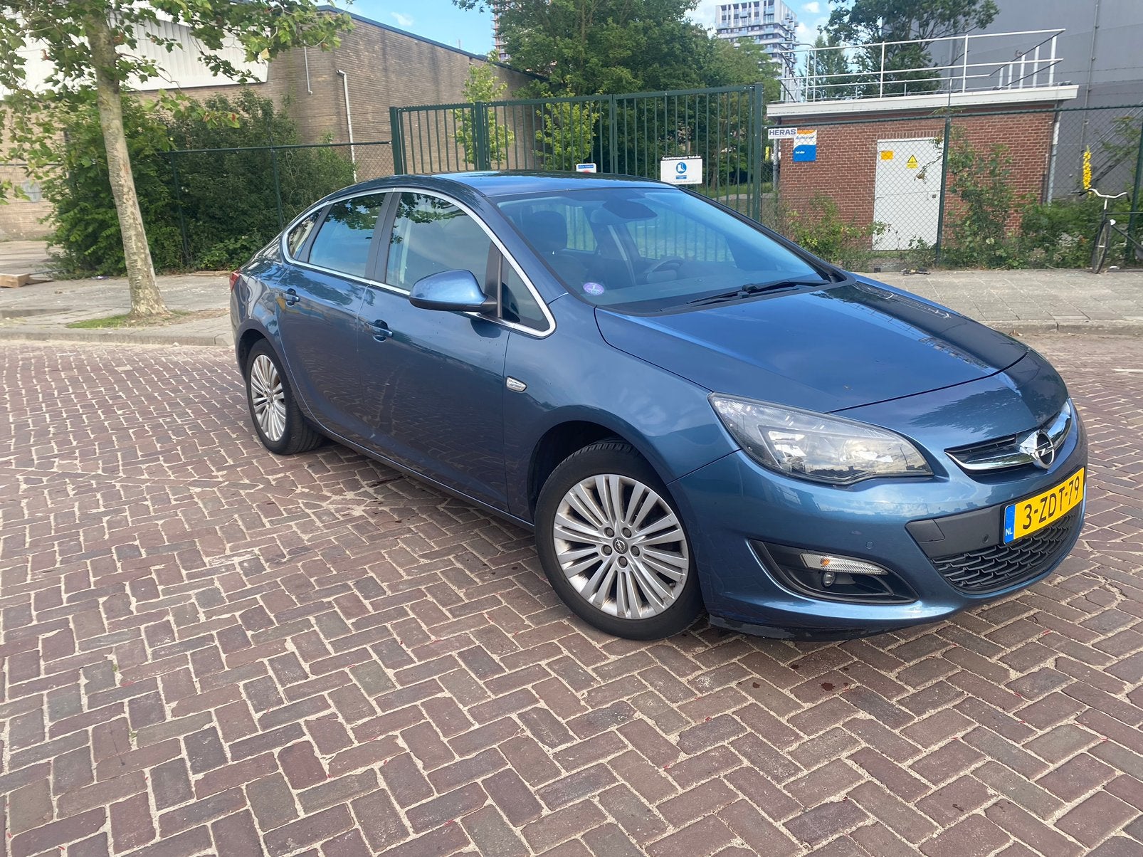 Opel Astra 1.4 Turbo 103KW 4D AUT 2014 Blauw, Auto's, Opel, Astra, Benzine, C, Sedan, Automaat, Origineel Nederlands, Blauw, Voorwielaandrijving