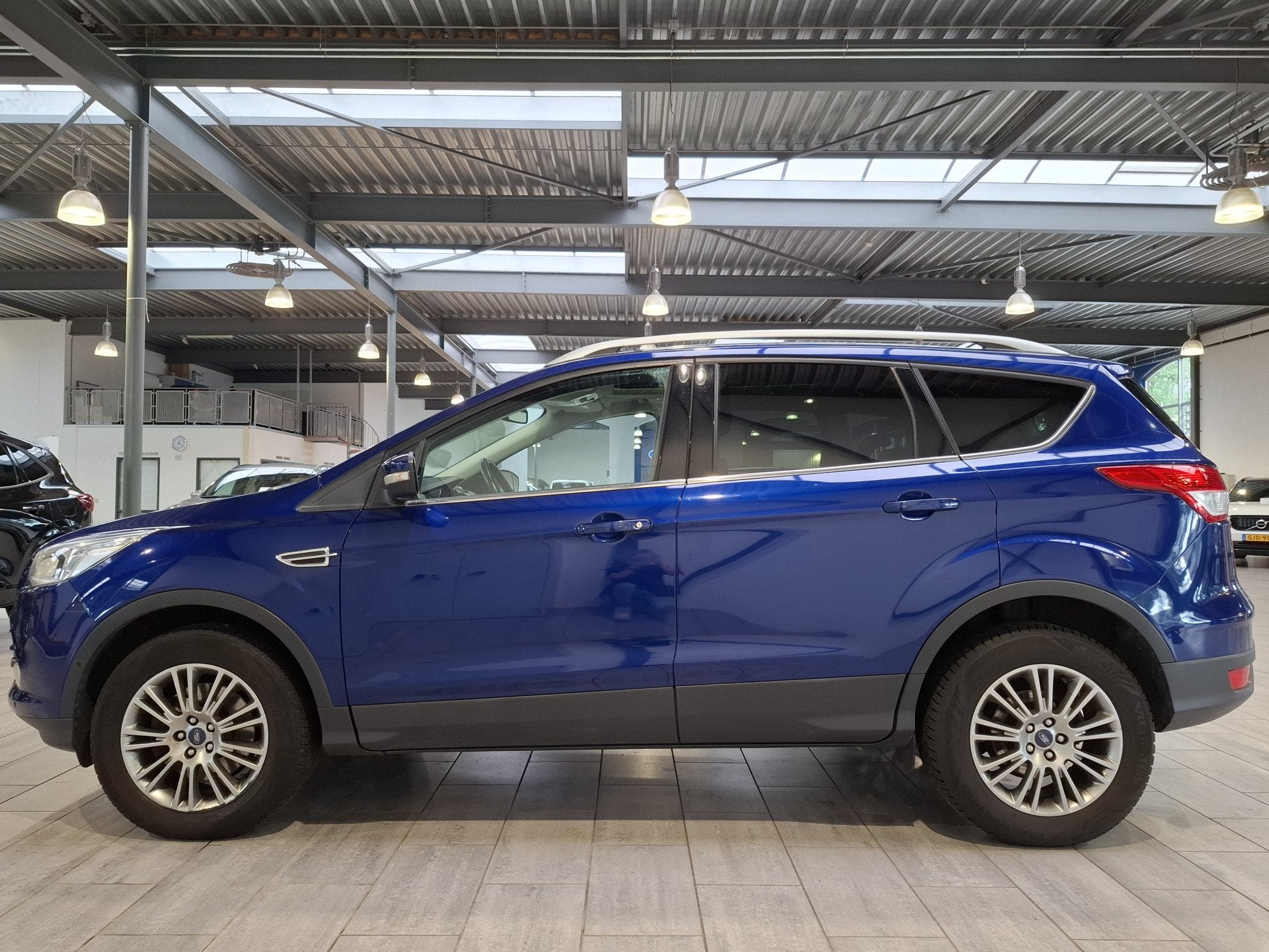 Ford Kuga 1.6 Titanium 183 pk Plus 4WD | Trekhaak | Pano | C, Auto's, Gebruikt, Zwart, 4 cilinders, Blauw