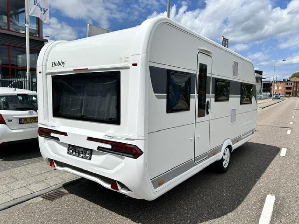 Hobby 495 UL De Luxe - 2026, Caravans en Kamperen, Overige typen, Rondzit, Hobby, Bedrijf