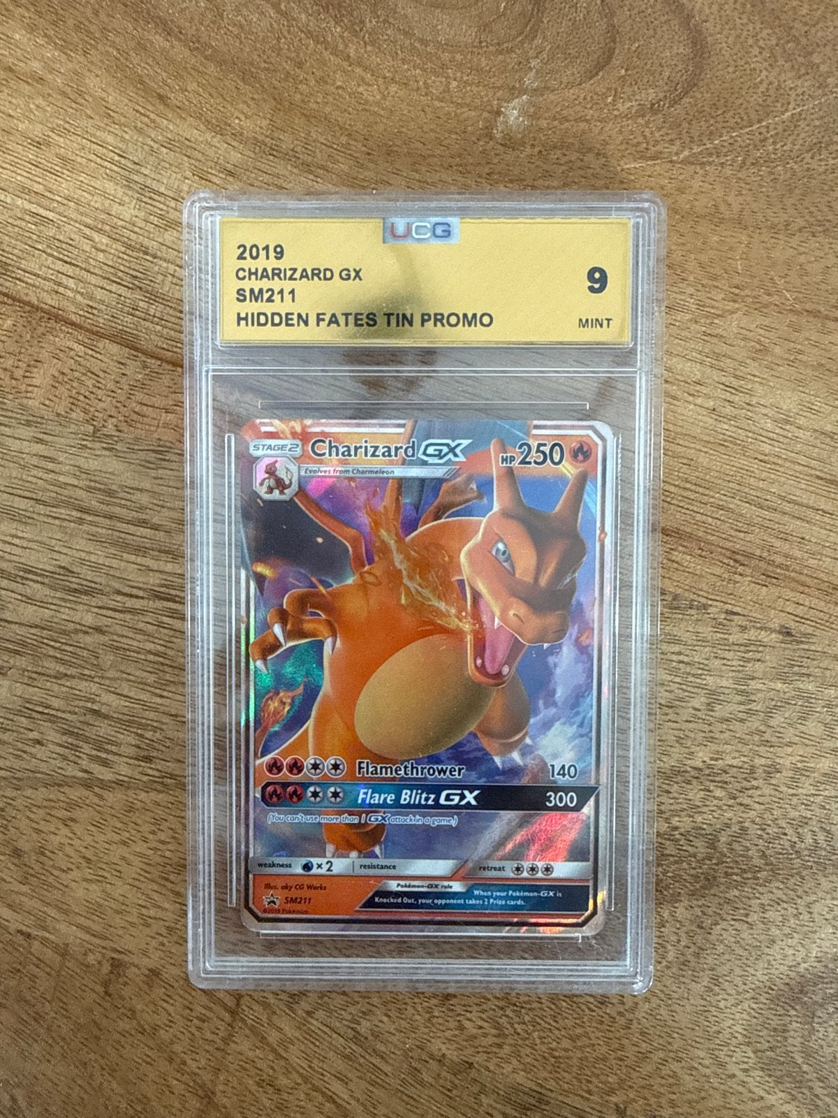 Charizard GX SM211 UGC 9 Mint Graded Pokémon Kaart, Hobby en Vrije tijd, Verzamelkaartspellen | Pokémon, Ophalen of Verzenden
