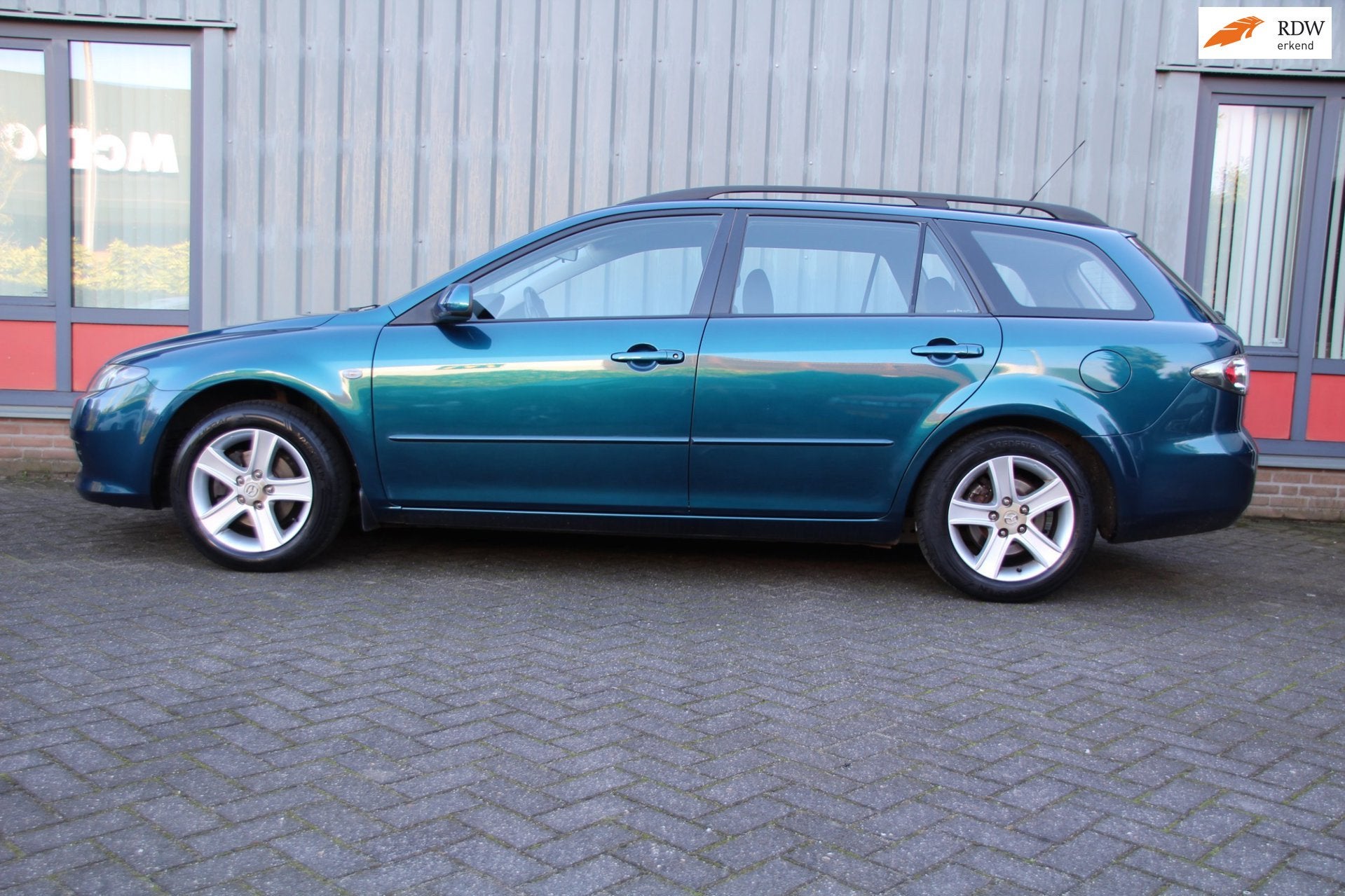Mazda 6 Sportbreak 1.8i Touring Generation Nieuwstaat + Set, Auto's, Stof, Gebruikt, 4 cilinders, Origineel Nederlands