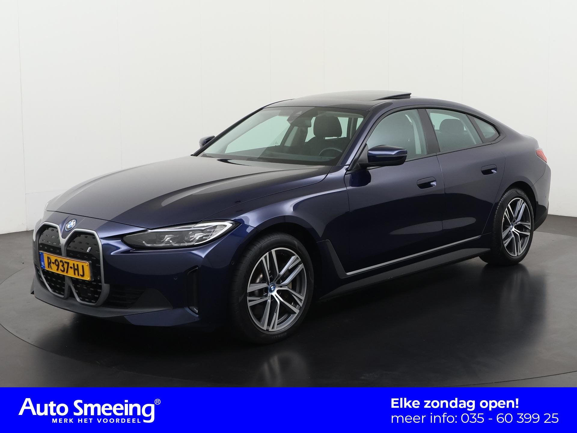 BMW i4 eDrive40 84 kWh | Schuifdak | ACC Stop&Go | Zondag Op, Auto's, 12 maanden, Achterwielaandrijving, Blauw, Leder en Stof