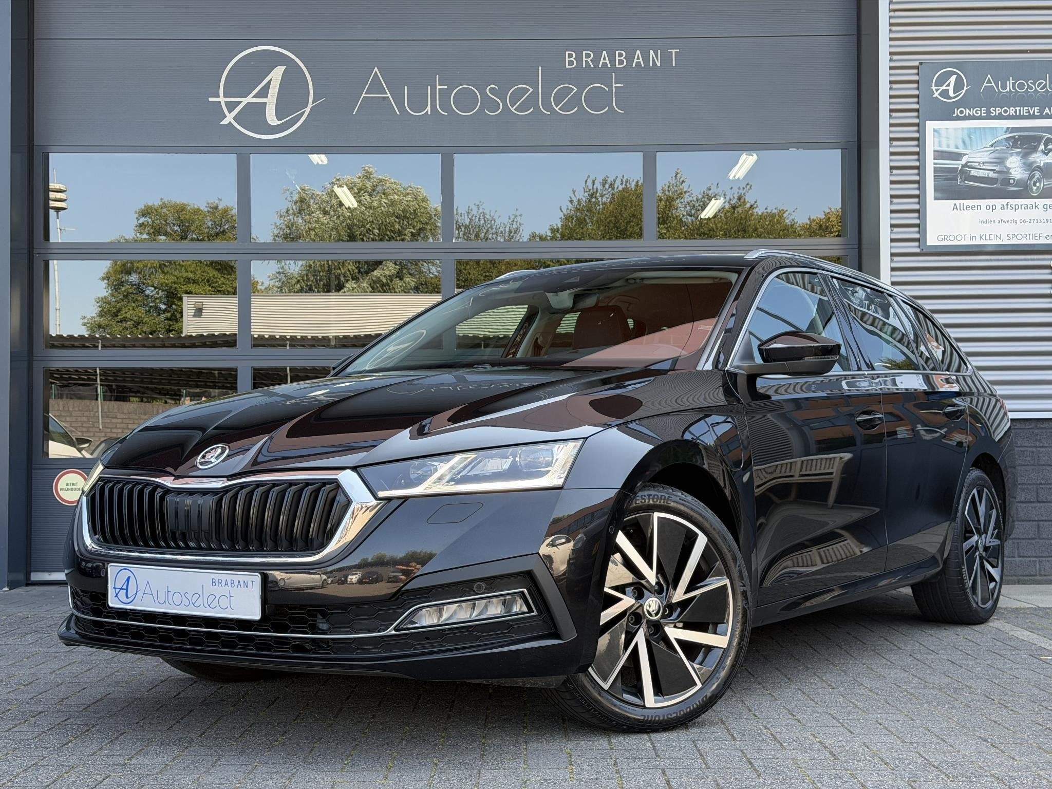 Skoda Octavia Combi 1.4 TSI iV PHEV Business Edition Navi |, Auto's, Skoda, Gebruikt, 150 pk, Zwart, Hybride Elektrisch/Benzine