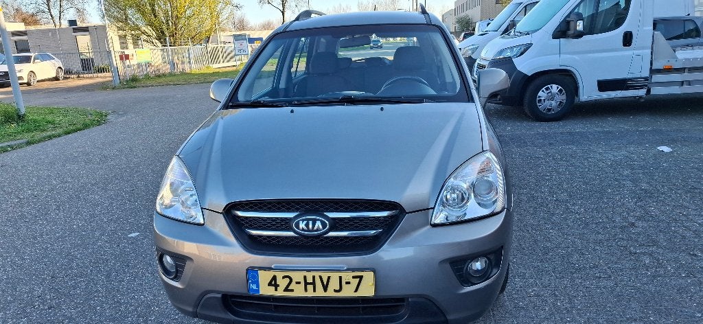 Kia Carens 2.0 Cvvt 5-ZIT AUT 2009 Grijs, Auto's, Kia, 1998 cc, Stof, 4 cilinders, 700 kg