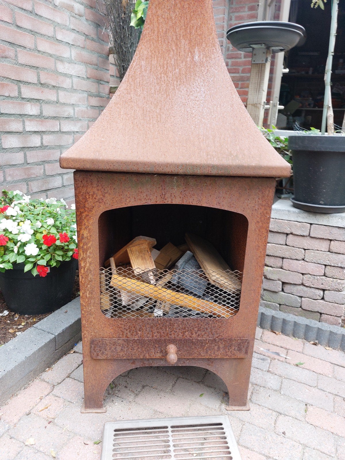 Buiten kachel voor gezellige avonden kan ook in barbecue, Ophalen