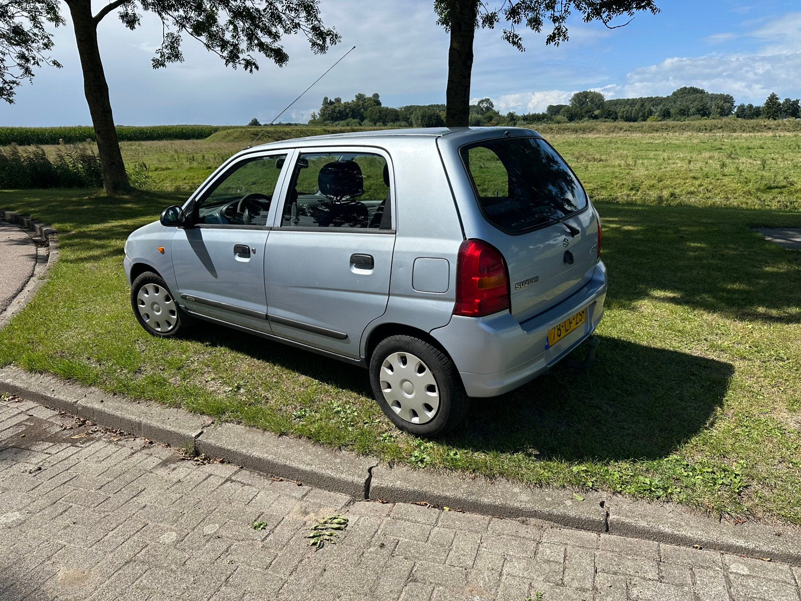 Suzuki Alto 1.1 16V 5d AGS 2002 Grijs, Auto's, 750 kg, 4 cilinders, 4 stoelen, Origineel Nederlands