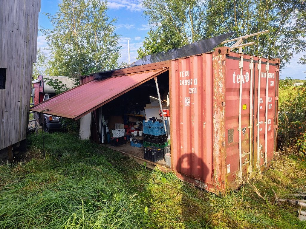 20ft haakarm container met zijklep, Ophalen