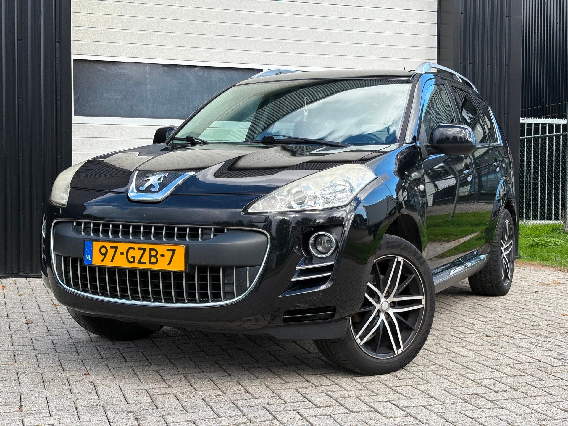Peugeot 4007 2.4 GT, Auto's, Dealer onderhouden, Gebruikt, Zwart, 4 cilinders