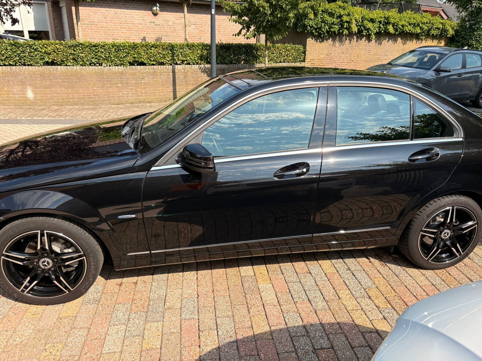 Mercedes-Benz C-Klasse 1.8 C180 CGI Sedan AUT 2010 Zwart, Auto's, Automaat, 745 kg, Achterwielaandrijving, 1800 kg