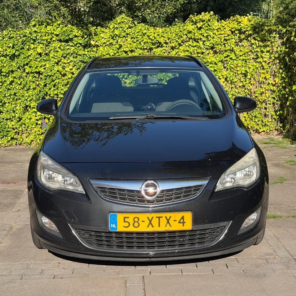 Opel Astra 1.3CDTI 70KW ST 2012 Zwart, Auto's, Opel, Voorwielaandrijving, Euro 5, Zwart, Zwart
