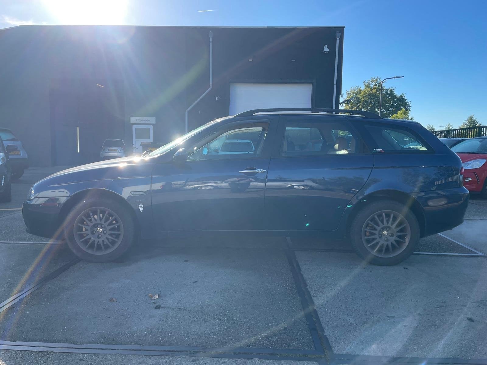 Alfa Romeo 156 Sportwagon 2.0 JTS Distinctive, Auto's, Voorwielaandrijving, Verwarmde buitenspiegels, Gebruikt, Blauw
