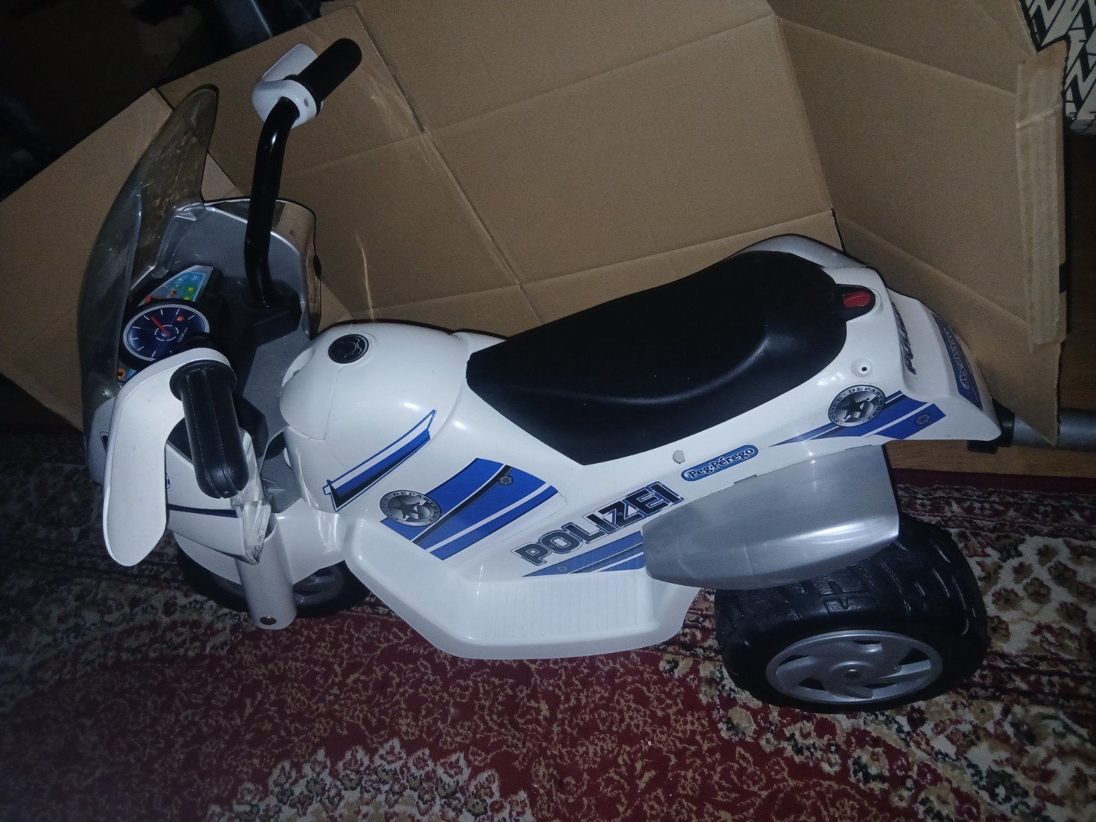 Grote politie kindermotor met lader (accu vervangen), Ophalen, Gebruikt